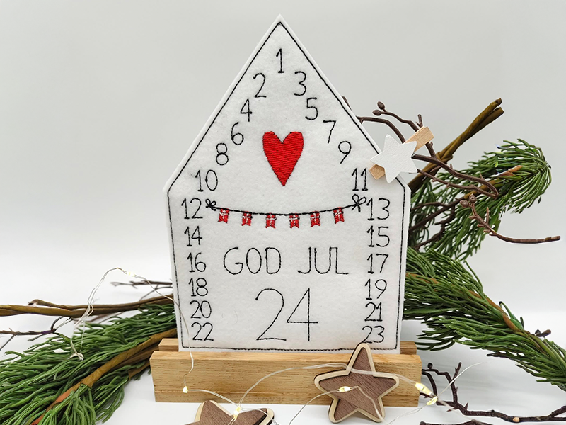 Preview: Adventskalenderhaus aus Filz God Jul - ITH-Stickdatei